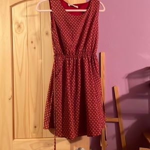 Sm Wardrobe red dress with small blue and yellow accents.